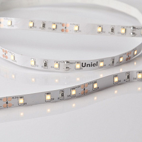 UNIEL ULS-M11-2835-60LED/m-8mm-IP20-DC12V-4,8W/m-5M-3000K PROFI катушка в герметичной упаковке Светодиодная лента